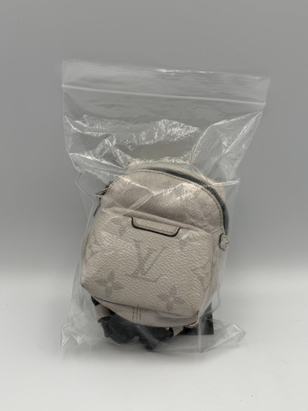 Louis Vuitton Taigarama Discovery Backpack Bag Charm White Key Holder M69318