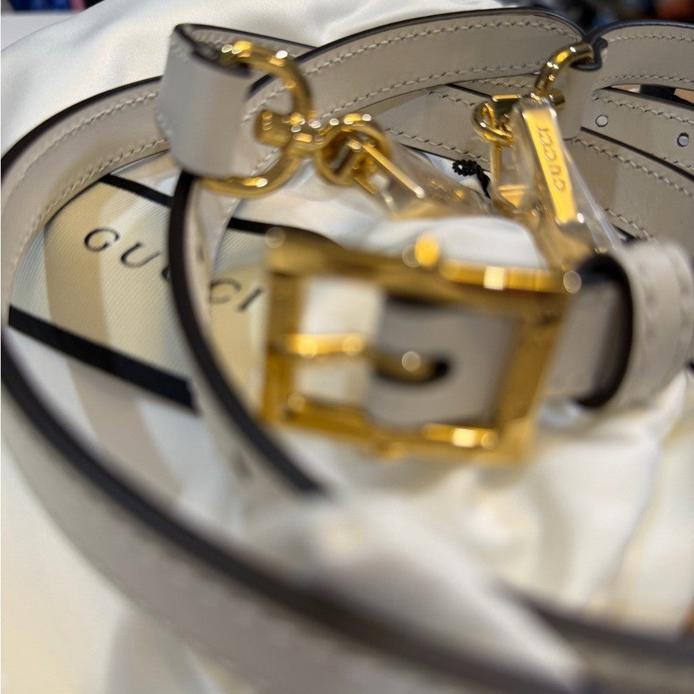 Gucci White leather straps with gold accent - NEW