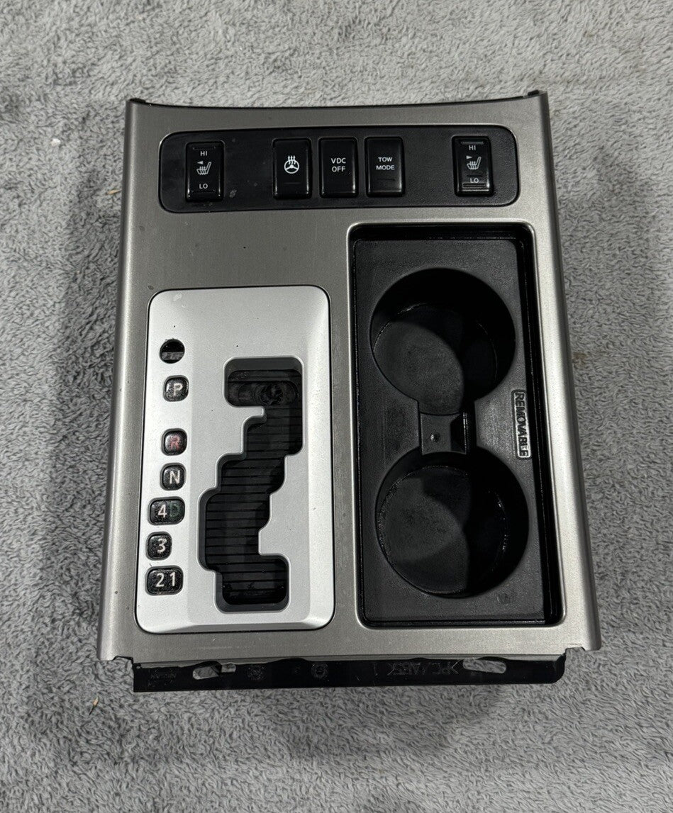 2008-2015 NISSAN ARMADA TITAN CENTER SHIFT SHIFTER TRIM BEZEL SILVER CUP HOLDER
