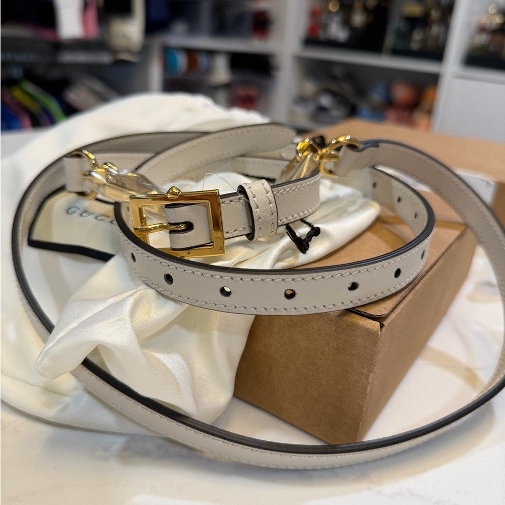 Gucci White leather straps with gold accent - NEW
