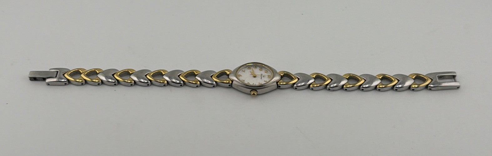 Bulova Womens Two Tone Heart Link Bracelet Quartz Watch Oval Dial