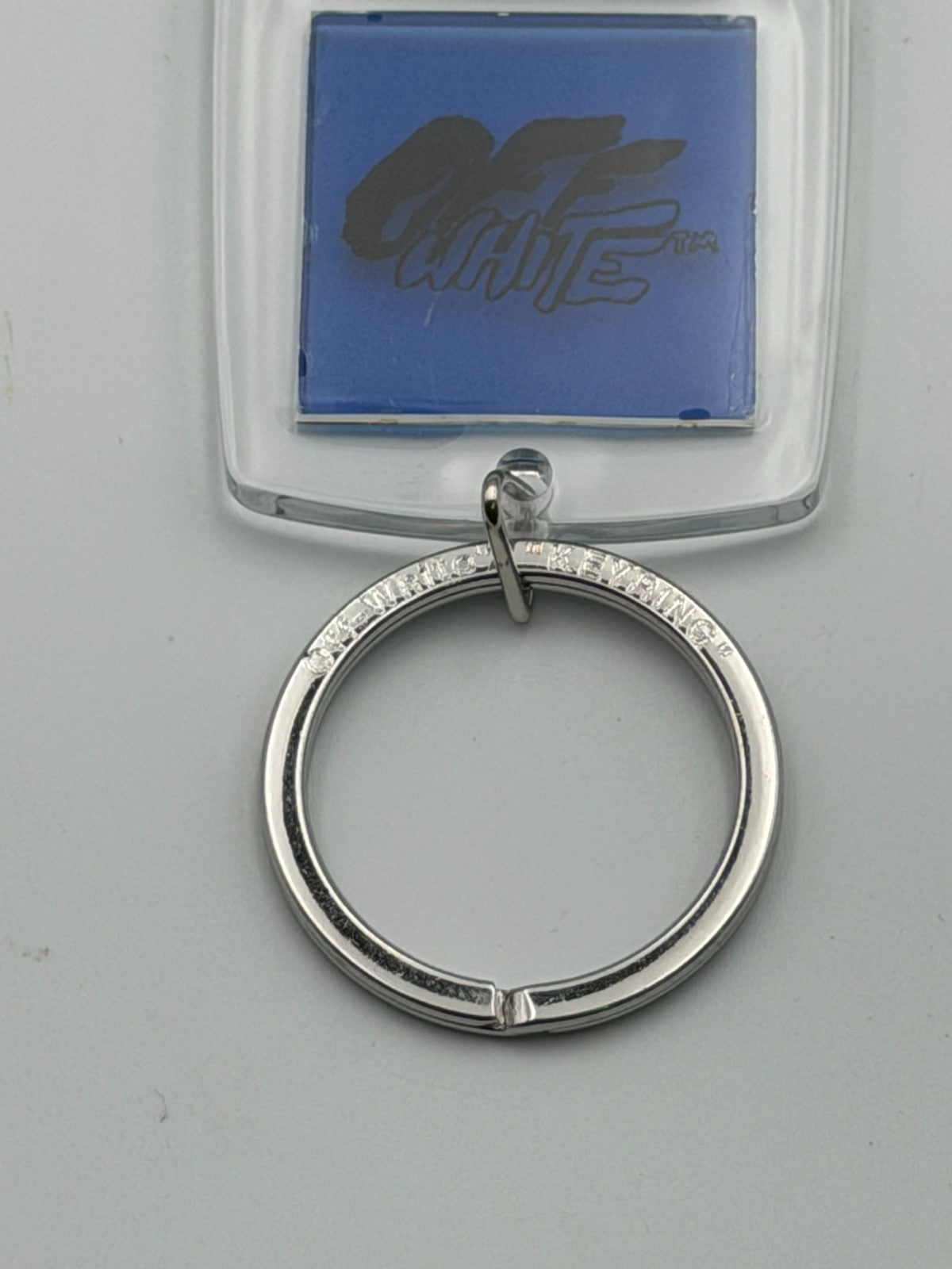New Off-White Spray Typo Transparent Blue Keychain Bottle Opener - One Size