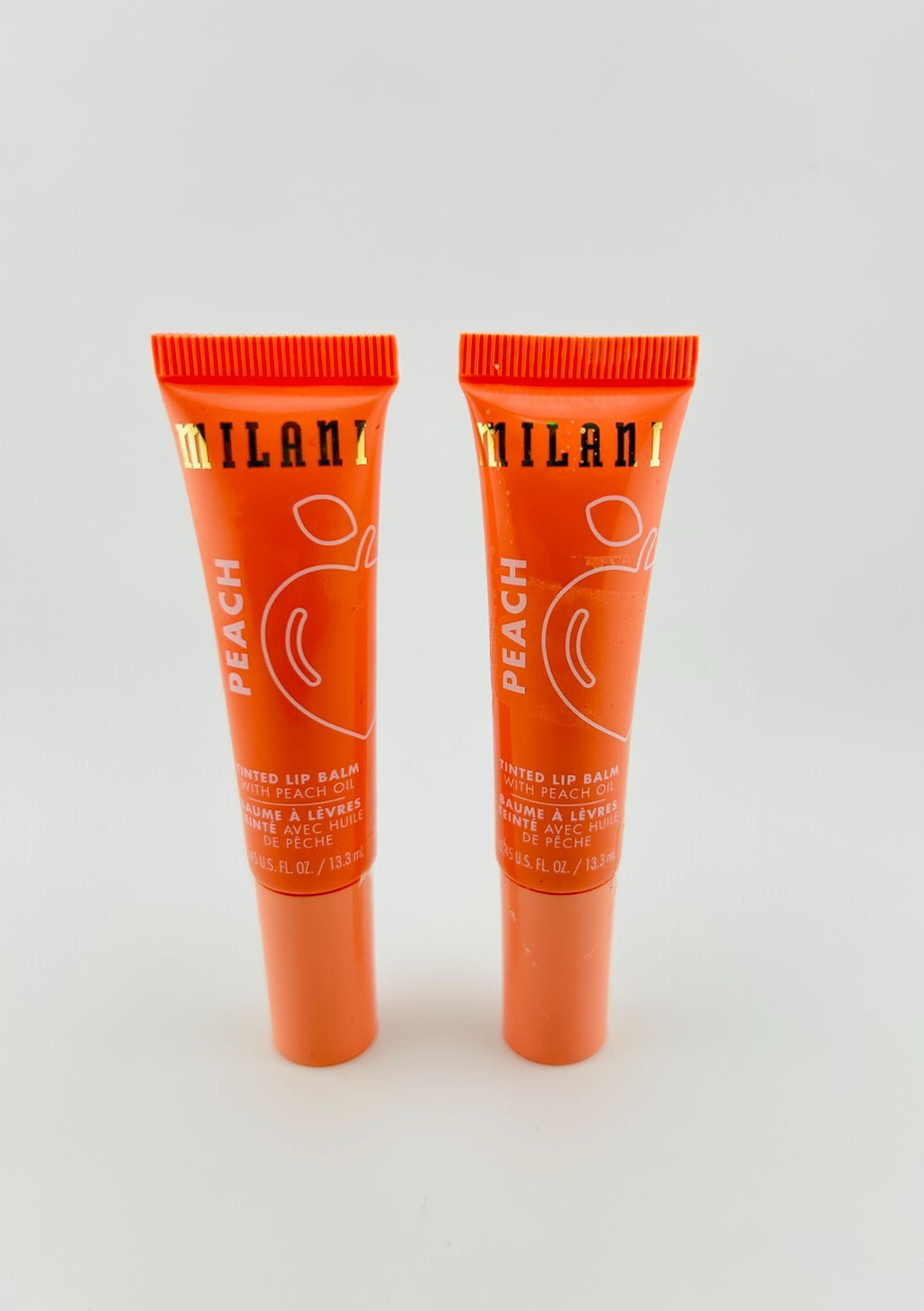 Set of 2 Milani Nourishing Regular Tinted Lip Balm with Peach Oil - 0.45 fl. oz