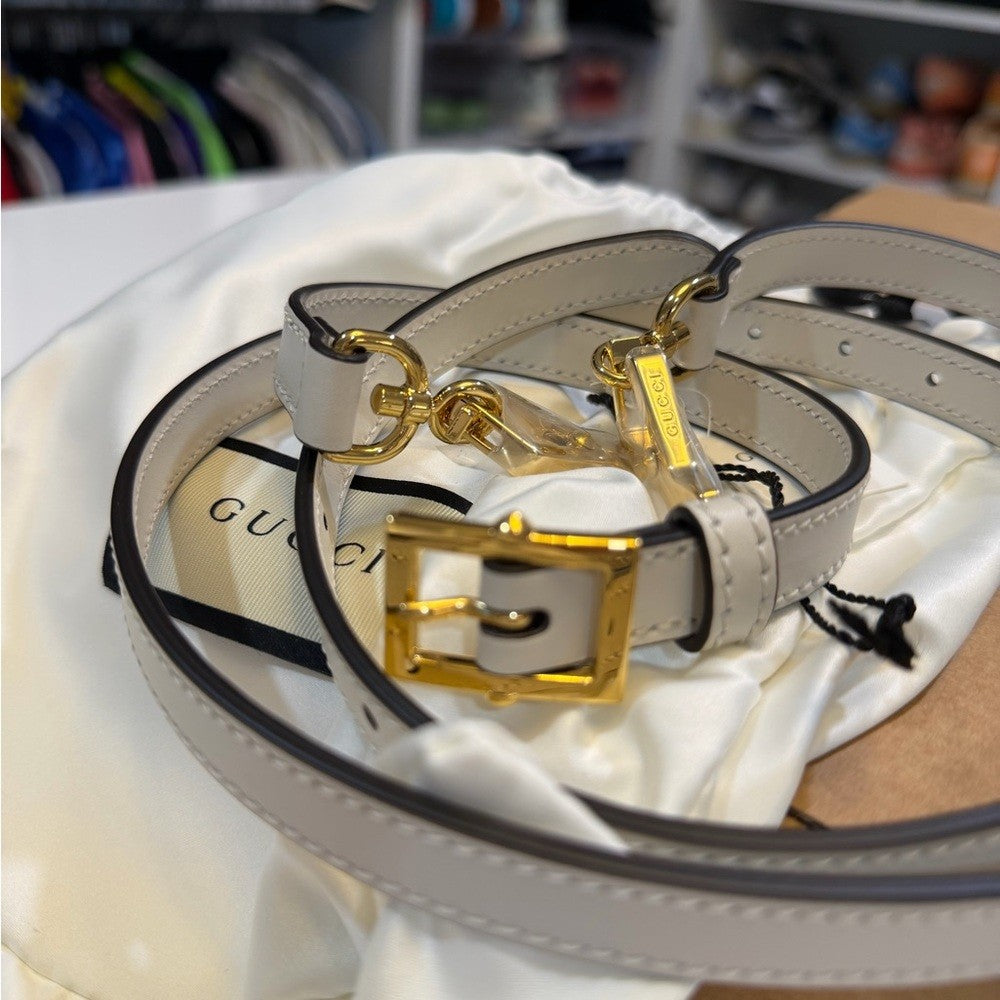 Gucci White leather straps with gold accent - NEW