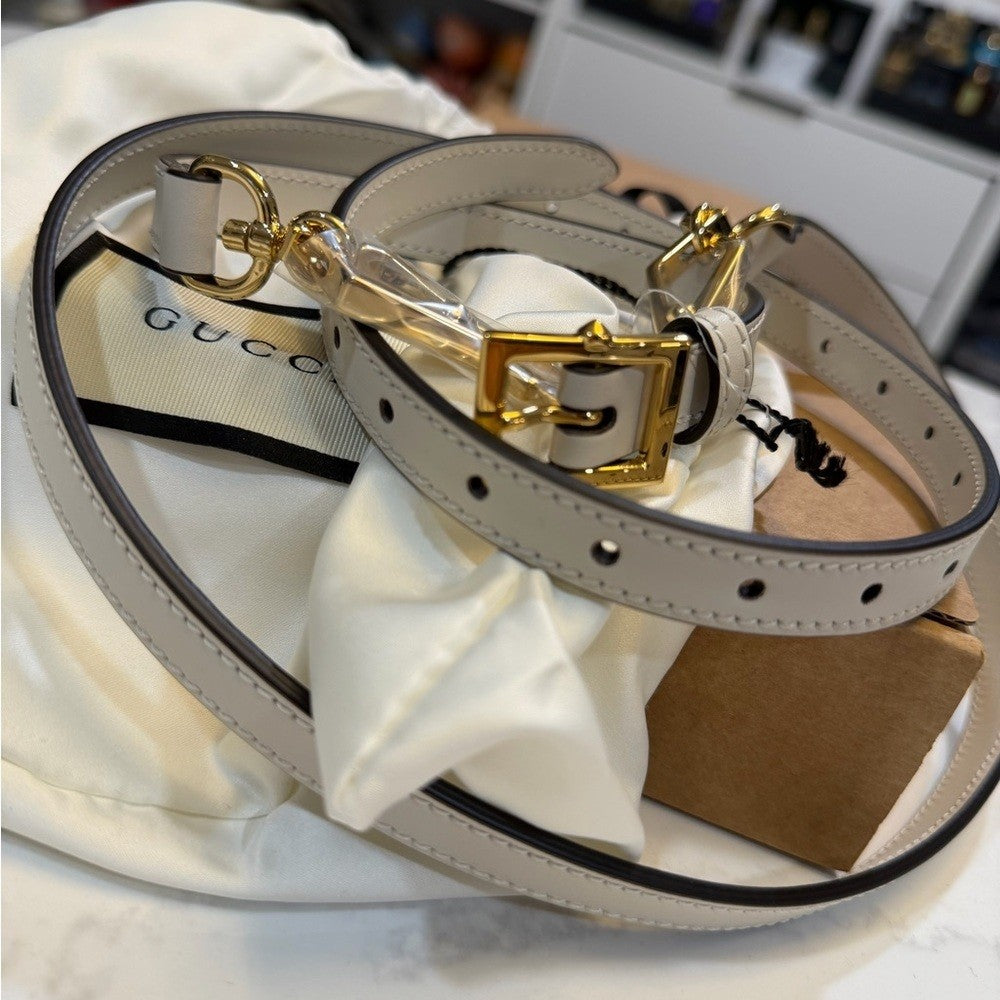 Gucci White leather straps with gold accent - NEW