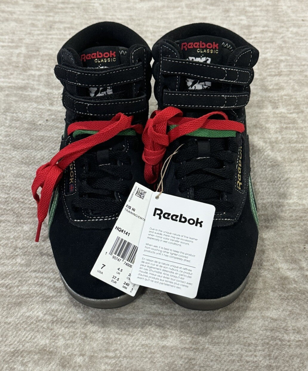 NEW Reebok Freestyle Hi Human Rights Now Womens Size 7 Black Lifestyle Sneakers