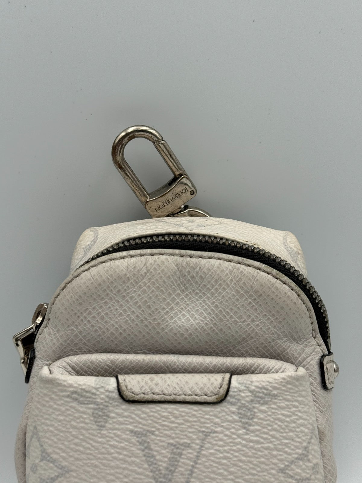Louis Vuitton Taigarama Discovery Backpack Bag Charm White Key Holder M69318