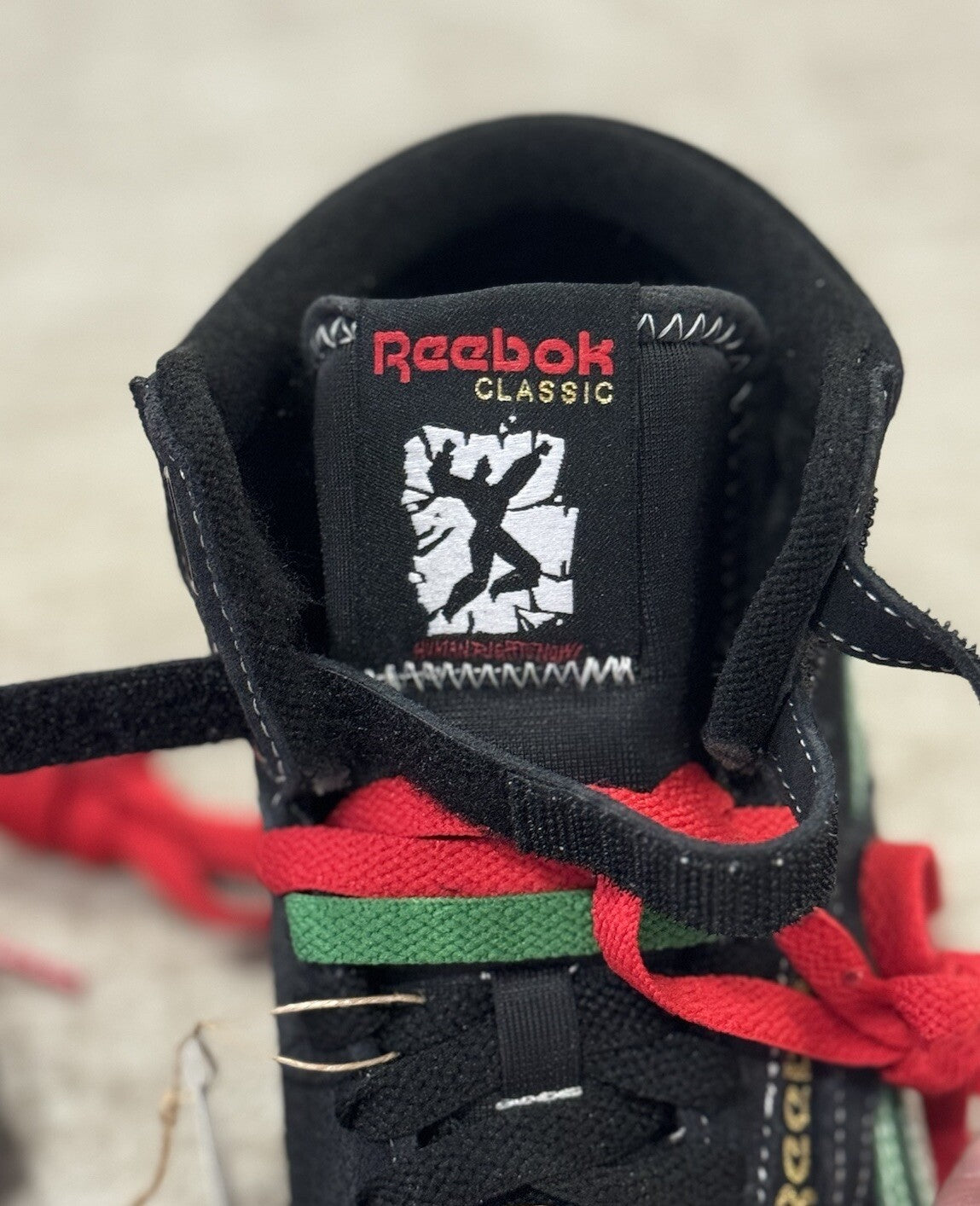NEW Reebok Freestyle Hi Human Rights Now Womens Size 7 Black Lifestyle Sneakers